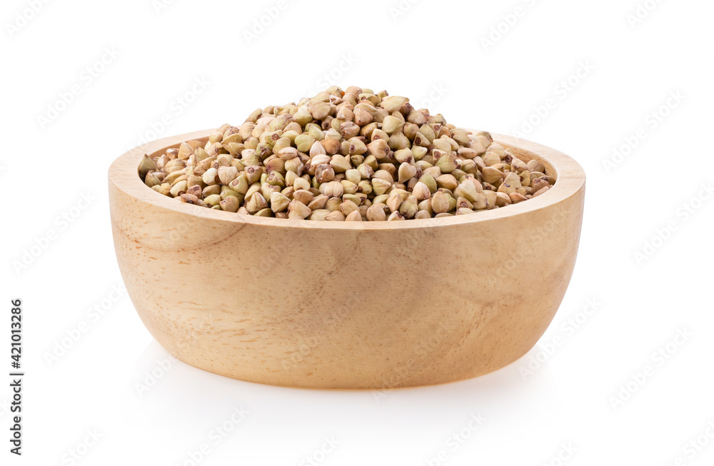 Buckwheat in wood bowl on the white background