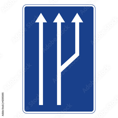 Rectangular traffic signal in blue and white, isolated on white background. Passage from two to three traffic lanes