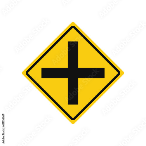 Rhomboid traffic signal in yellow and black, isolated on white background. Warning of crossroad