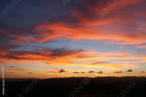 Pink and orange clouds in the evening sky, natural background