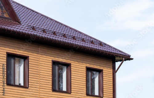 House roof against the blue sky.