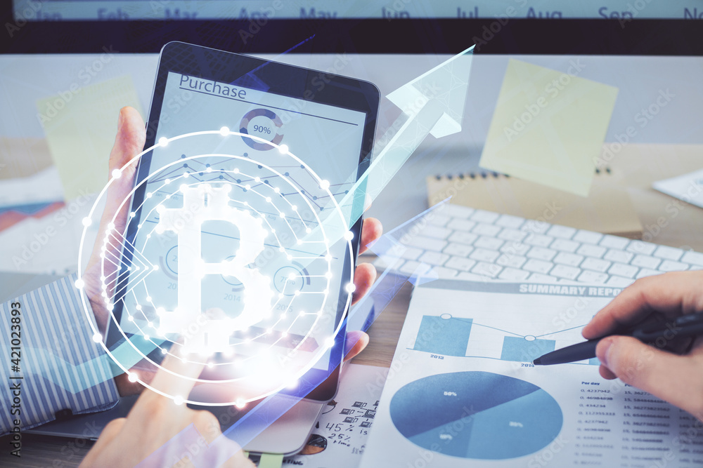 Double exposure of man's hands holding and using a phone and crypto currency blockchain theme drawing. Double exposure of man's hands holding and using a phone and crypto currency blockchain theme drawing.
