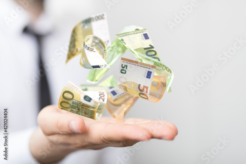 bill euro banknote in hand rain