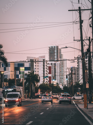 traffic in the city Miami Florida light. buildings street travel 