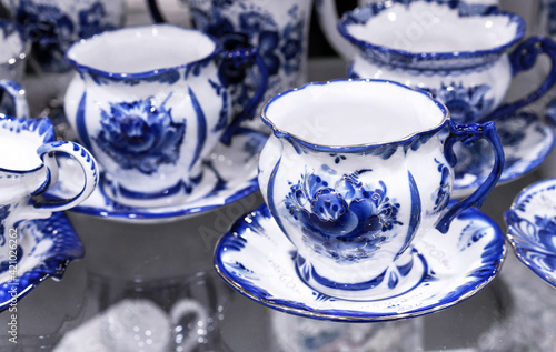 Porcelain cups and saucers made in Russian Gzhel style.