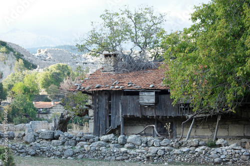 Old rustic wooden house in countryside.
