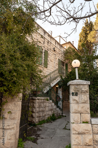 Evening  view of a quiet residential Olifant Street in the old district of Jerusalem Talbia - Komiyut in Jerusalem, Israel photo