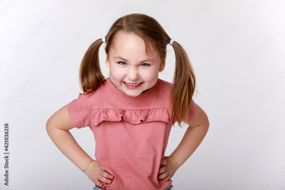 Little girl with a sly emotion on her face Little girl with a sly emotion on her face