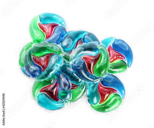 Heap of laundry capsules on white background  top view