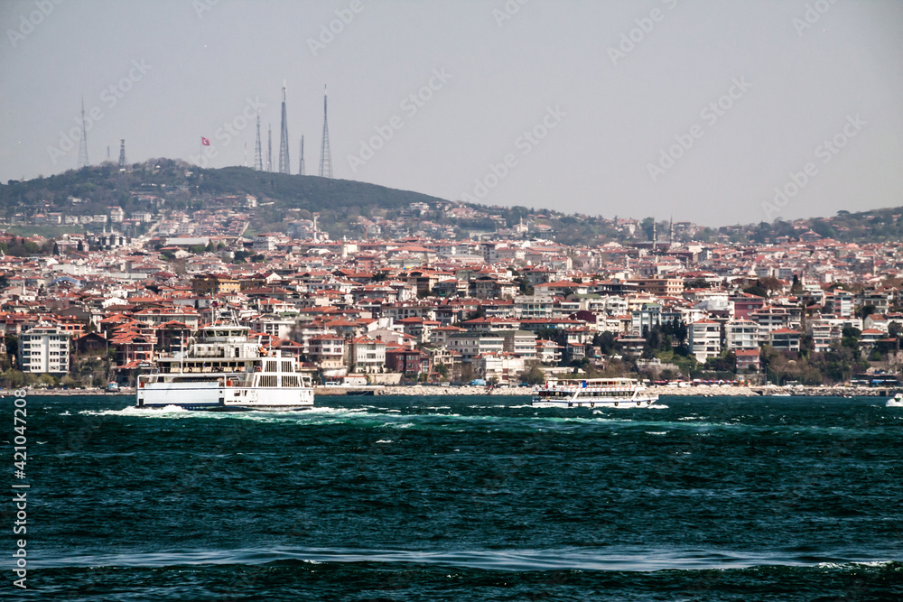 vibrant travel photo taken in the Bosporus Strait in Istanbul, Turkey.