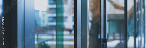 Glass walls as abstract urban background, exterior design and architectural detail closeup