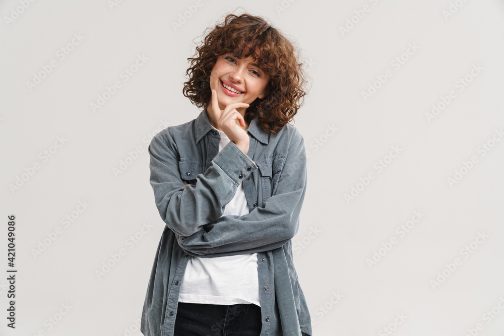Young ginger happy woman smiling and looking at camera Young ginger happy woman smiling and looking at camera