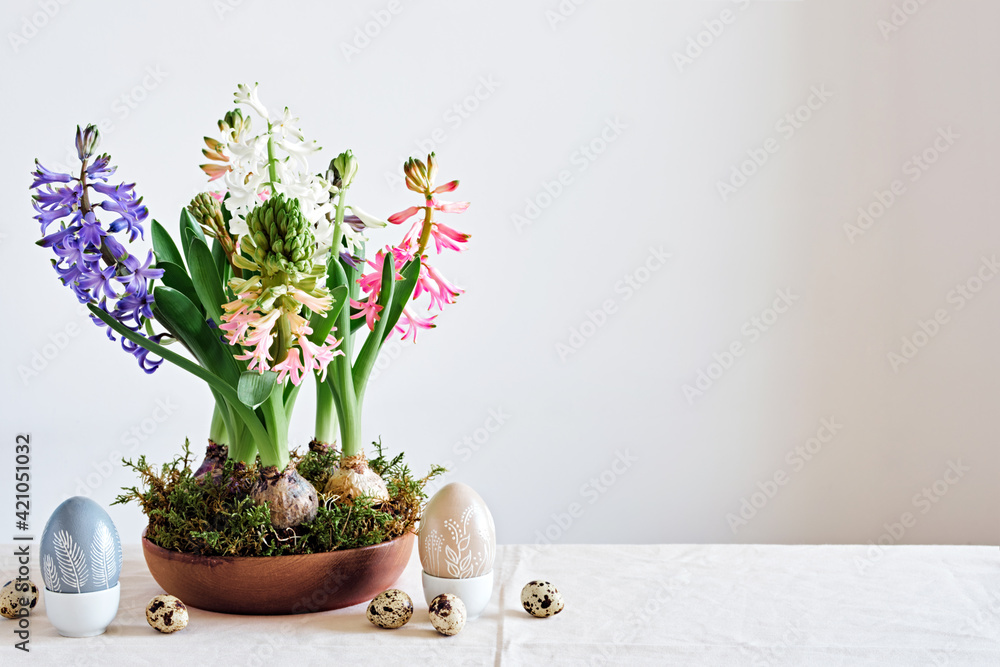 Easter composition from hyacinths flowers and quail eggs on linen tablecloth. Zero Waste Easter