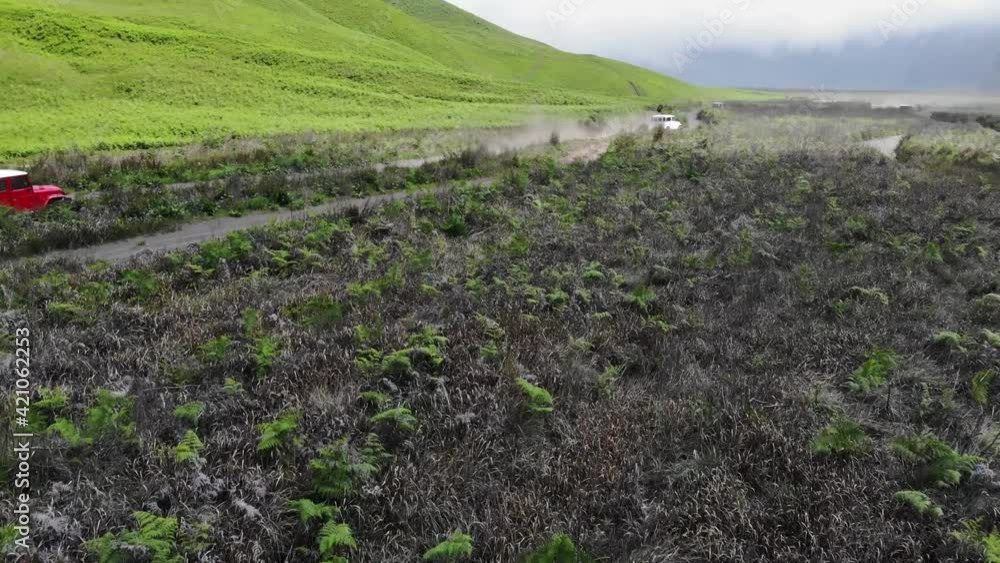 Java Indonesia Bromo green fields landscape 4x4 suv drone 4k Java Indonesia Bromo green fields landscape 4x4 suv drone 4k