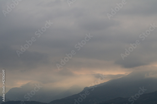 clouds over the mountains,nature,evening, color, dusk,evening,sunrise, © Daniele