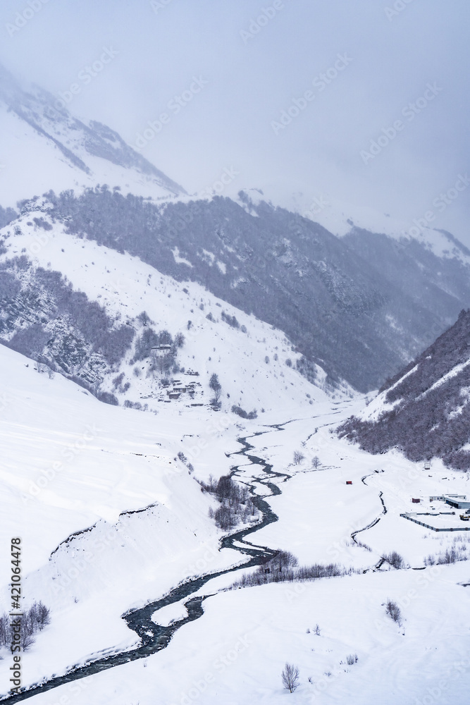 Snowy winter mountains in Georgia. Caucasus Mountains