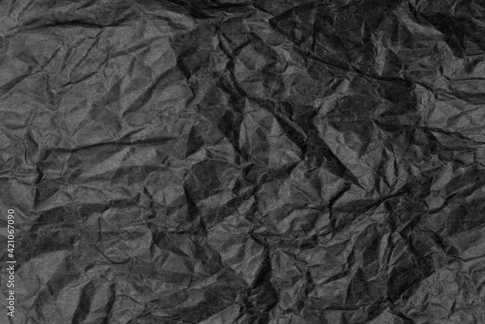 Crumpled black paper for background image Crumpled black paper for background image
