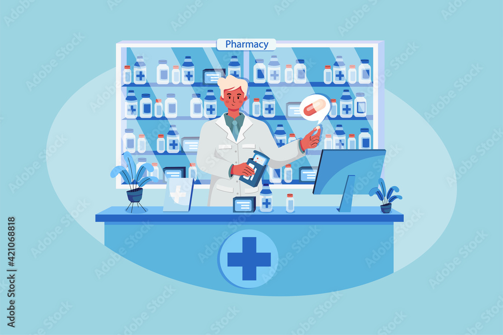 A pharmacist holding a medicine box and a capsule in a pharmacy A pharmacist holding a medicine box and a capsule in a pharmacy