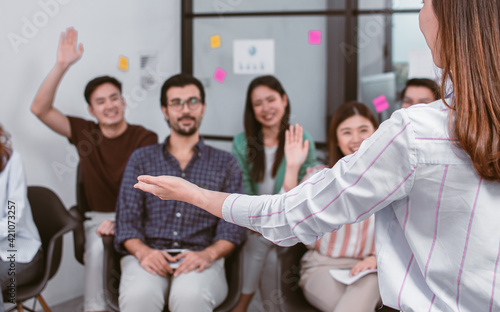 Photos Selective focus on hand of speaker who standing in seminar room