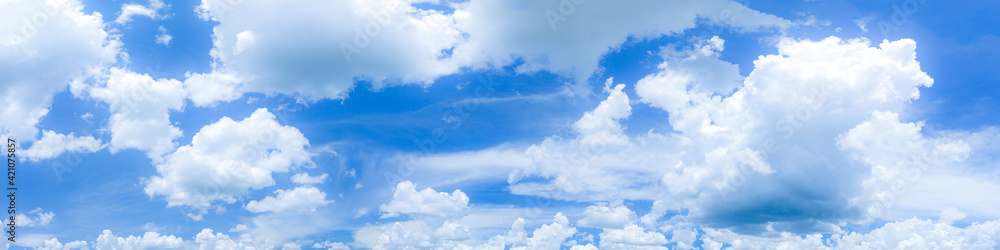 Obraz premium blue sky background with tiny clouds. panorama,Abstract white cloud and blue sky texture background