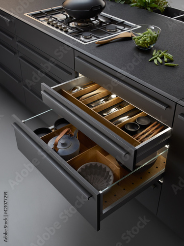 Fotografering Modern kitchen, Open drawers, Set of cutlery trays in kitchen drawer