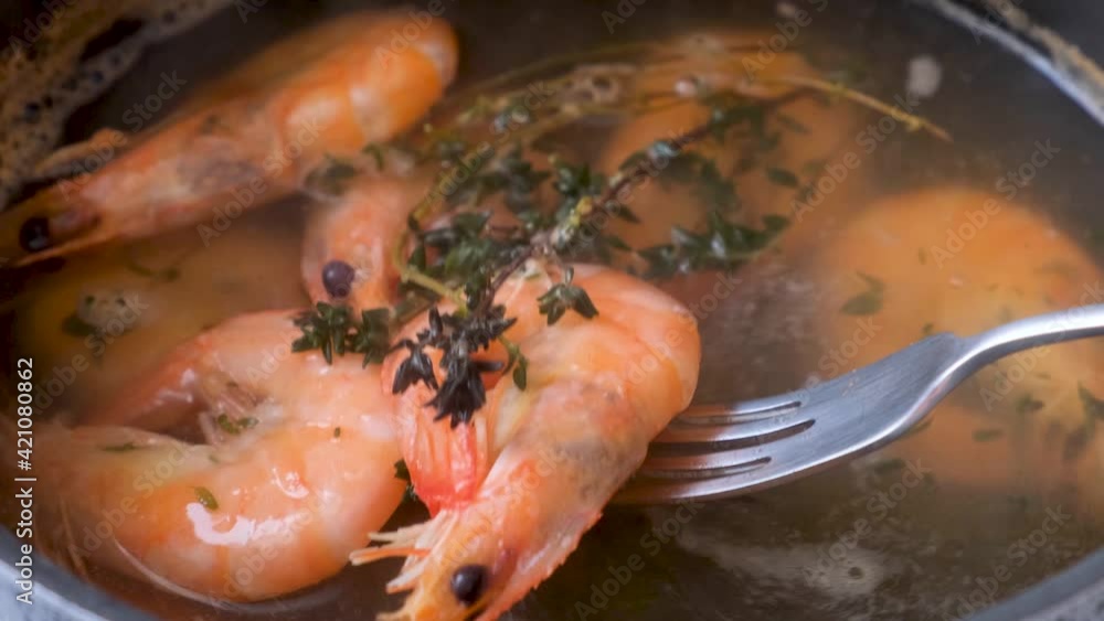shrimps are cooked in boiling water with spicy herbs. Close-up, 4K video, no people shrimps are cooked in boiling water with spicy herbs. Close-up, 4K video, no people
