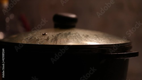 evaporation on the pan lid, glass with evaporation. Cooking steam on the lid close-up. Cooking