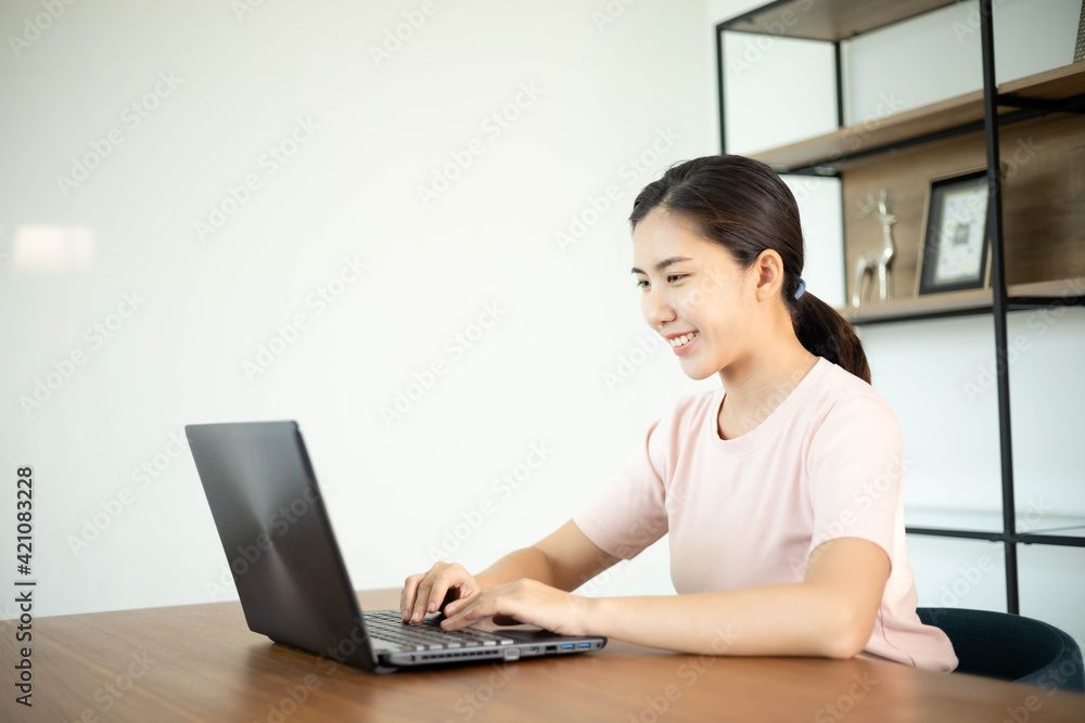 Asian business woman with notebook in the office Asian business woman with notebook in the office