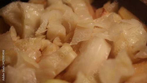 we prepare vegetable dishes from cabbage, potatoes and other ingredients, the chef will mix the products in a saucepan