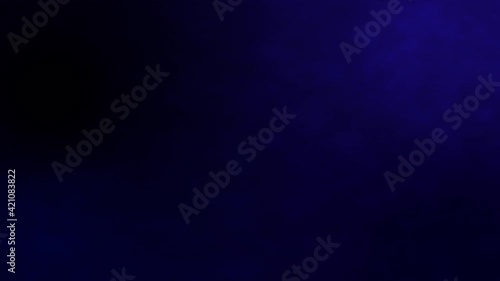 Abstract white smoke in slow motion dark blue background. Blue flare light beam with smoke and dust particle effect abstract background.  abstract light motion titles cinematic background.