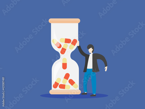 Time to take your medication. Clock with pills.
