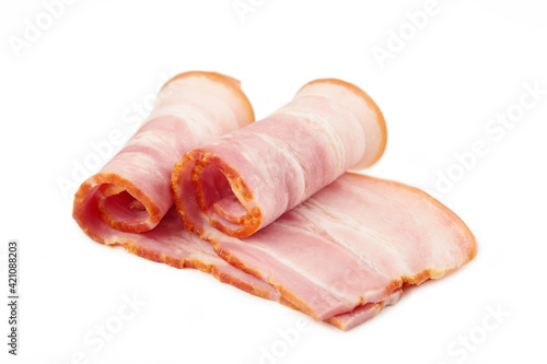 Fresh raw slices bacon isolated on white background. Roll of bacon