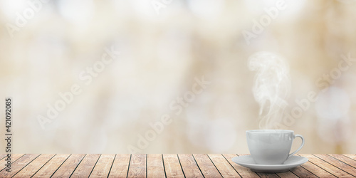 hot coffee on the table on a winter background