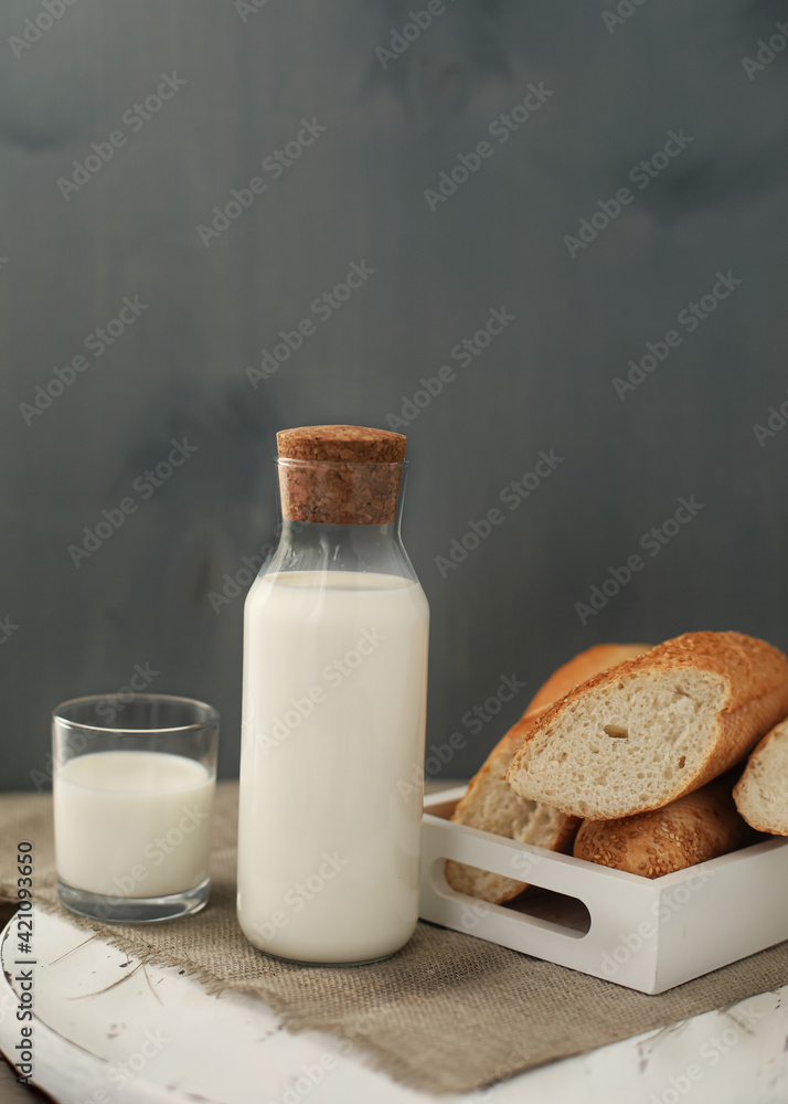 Fresh milk with baguette and strawberries Fresh milk with baguette and strawberries
