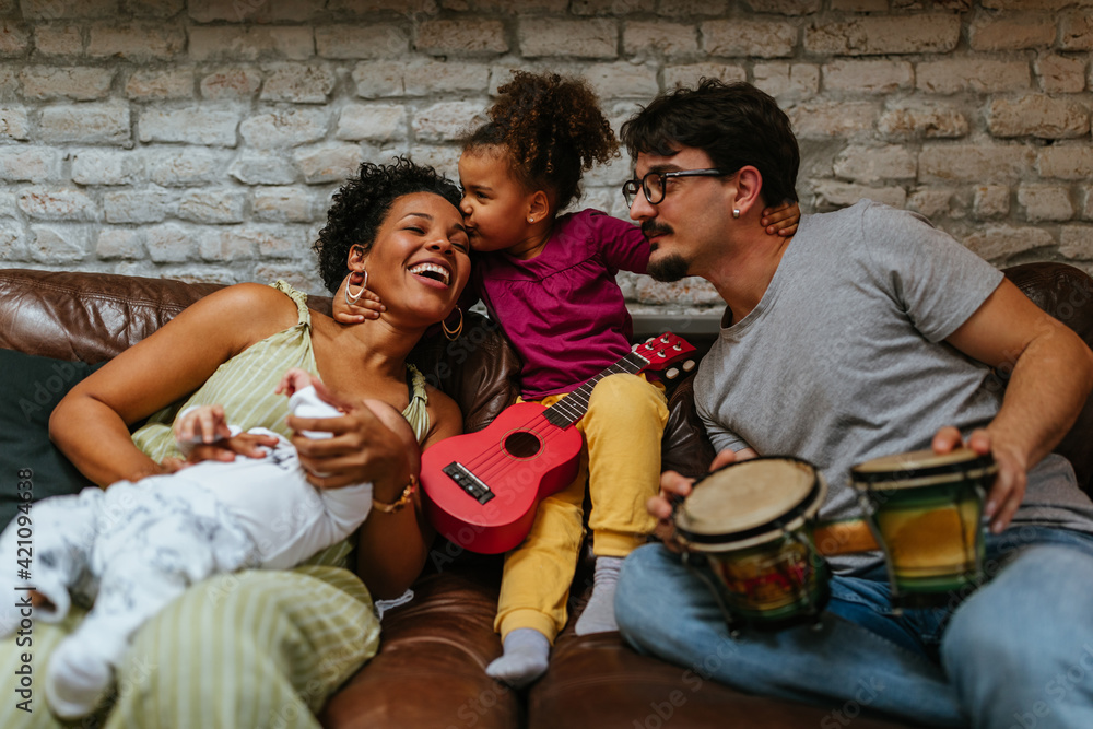 Bonding time of adorable multiracial family at home Bonding time of adorable multiracial family at home