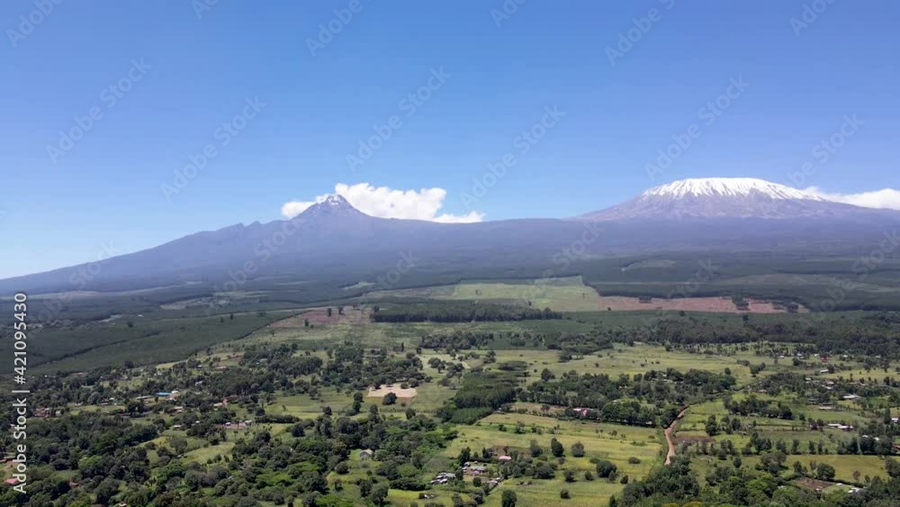 Basin view of the mount Kilimanjaro in Africa Kenya. Natural view of mount Kilimanjaro. natural small village of Loitokitok Kenya with the Mount Kilimanjaro in the background. Basin view of the mount Kilimanjaro in Africa Kenya. Natural view of mount Kilimanjaro. natural small village of Loitokitok Kenya with the Mount Kilimanjaro in the background.