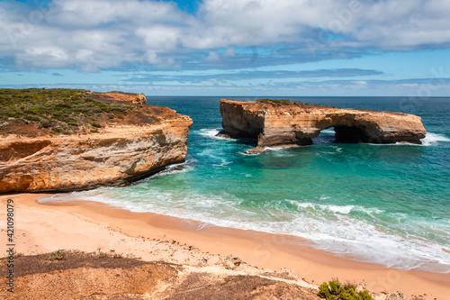 Image of the iconic London Bridge. It's a famous rock formation along the great ocean road in Australia. Beautiful destination for a road trip to the most famous tourist spots. 