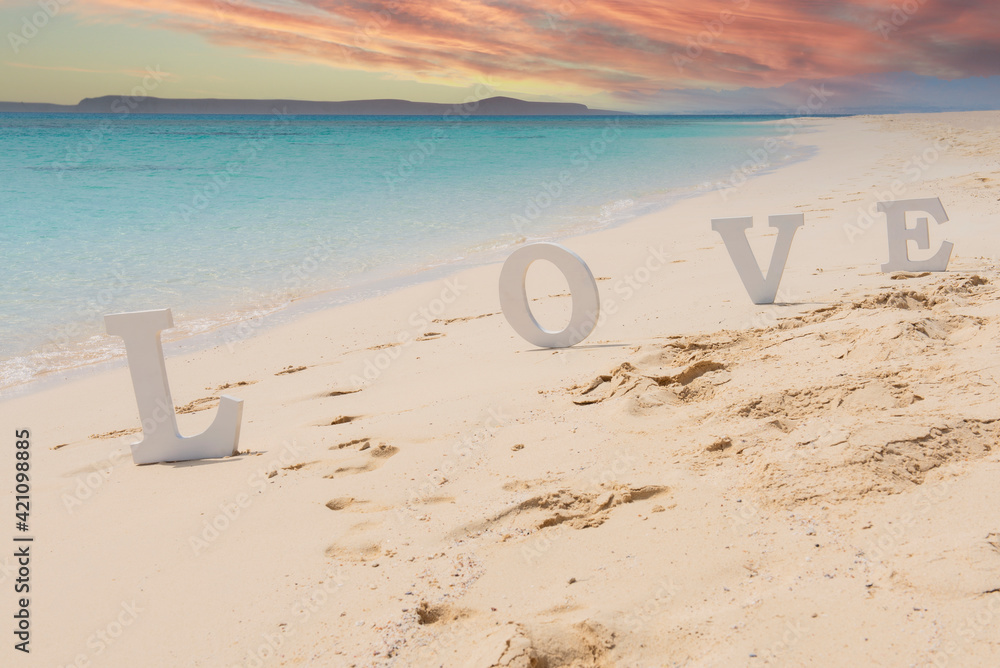 Romantic love sign on a tropical beach paradise