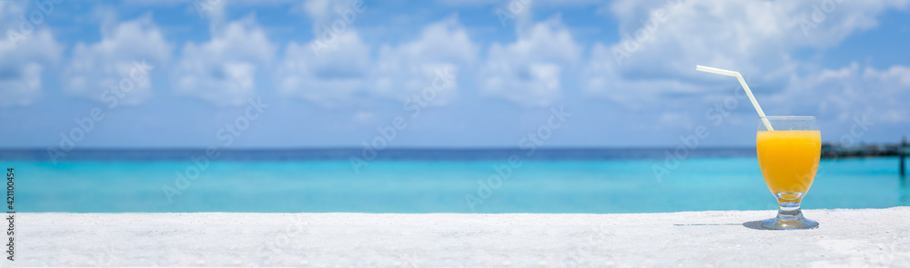 Fototapeta premium Fruity welcome drink on tropical vacation. Long banner