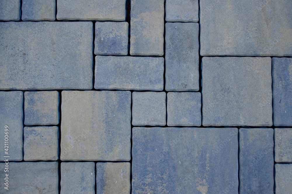 Naklejka premium texture of gray square brick, background