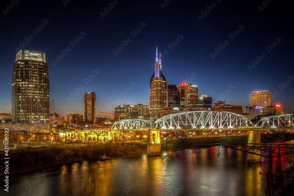 Nashville night skyline along the Cumberland river from the Korean Veterans Blvd bridge