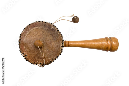 Damaru drum percussion instrument with a handle on a white background. Isolated. Top view. photo