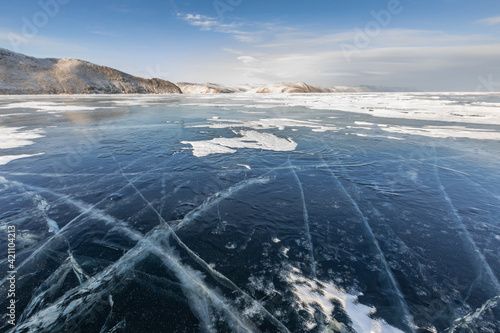 Fototapeta Naklejka Na Ścianę i Meble -  Frozen Lake Baikal. Blue ice, winter landscape.
