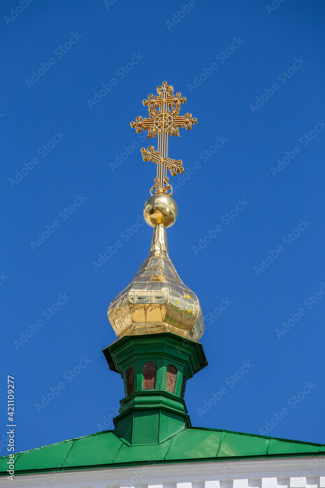 Beautiful domes of Christian Church on blue sky background