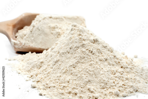 Wheat flour. Flour close-up. An ingredient for baking bread and rolls. Scoop with flour