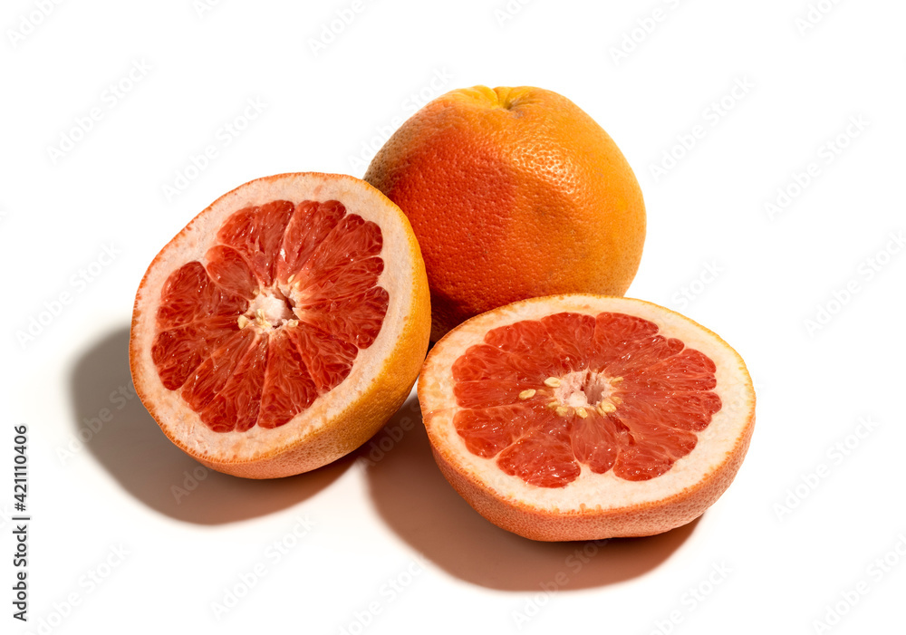 Whole grapefruit with half grapefruits, isolated on white Whole grapefruit with half grapefruits, isolated on white
