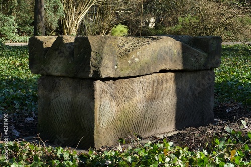 Römischer Sarkophag im grünen in Köln-Zollstock photo