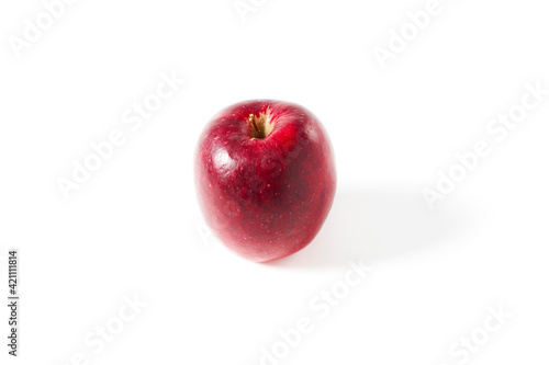 Red apple of the Story variety on a white background