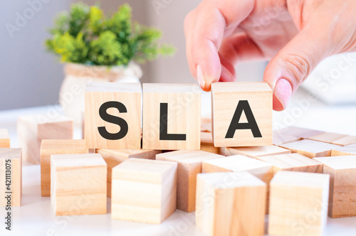 sla concept with wooden blocks on table, business concept photo
