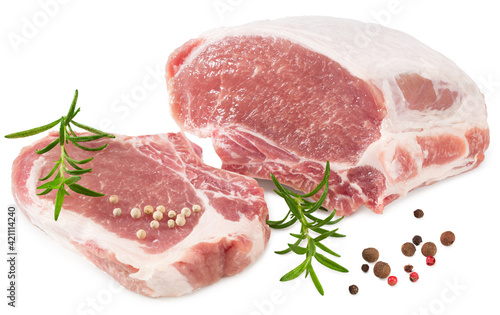 raw pork meat with rosemar, peppercorn and slices isolated on white background. Clipping path and full depth of field